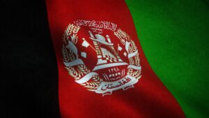 A closeup shot of the waving flag of Afghanistan with interesting textures